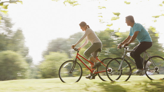 Older couple enjoying a bike ride